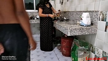 Desi housewife's kitchen encounter with black-clad lover